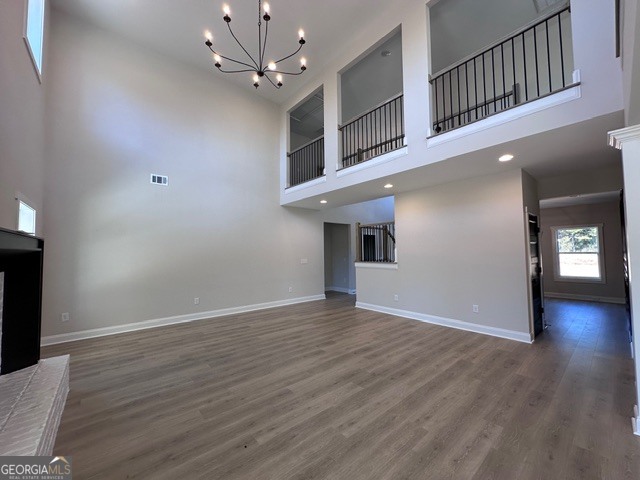 3647 Youngs Mill Road Hogansville, GA 30230 - Photo 6 of 34 wooden floor in an empty room with a window