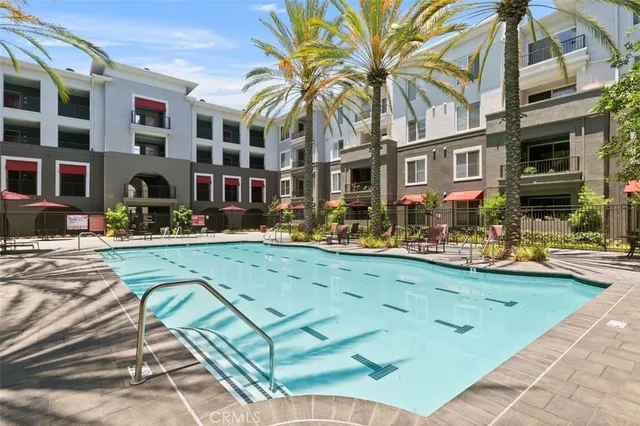 a view of a building with a swimming pool