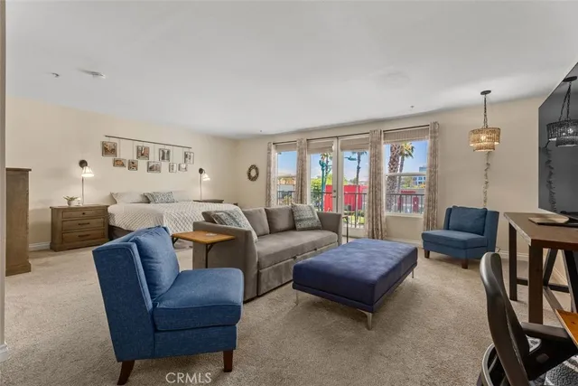 a living room with furniture or couch and a window