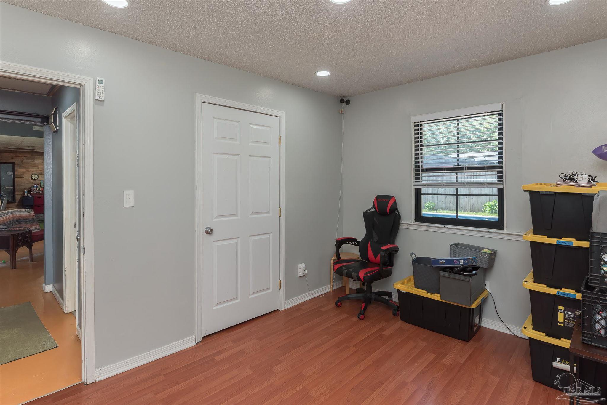 2322 Silversides Loop Pensacola, FL 32526 - Photo 15 of 29 a workspace with furniture and a window