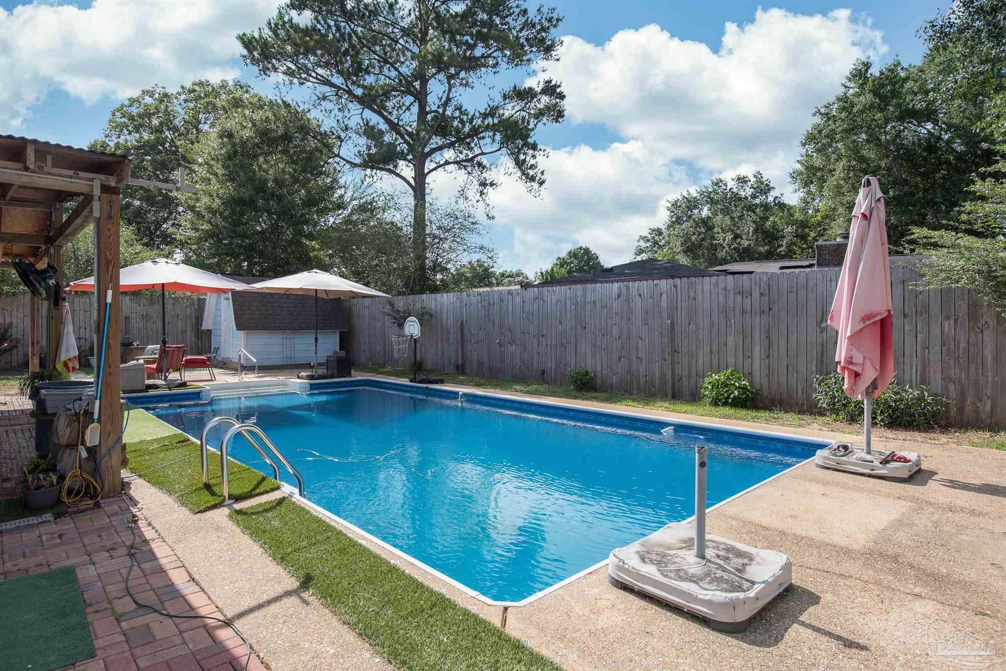 2322 Silversides Loop Pensacola, FL 32526 - Photo 22 of 29 a view of swimming pool with chairs