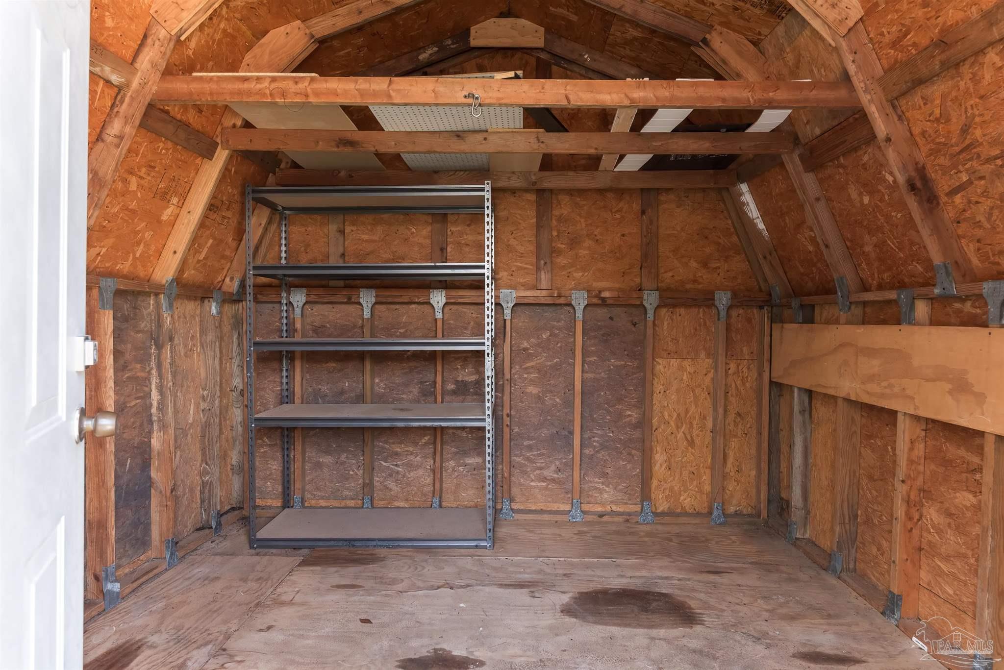 2322 Silversides Loop Pensacola, FL 32526 - Photo 26 of 29 a view of a wooden door of the house