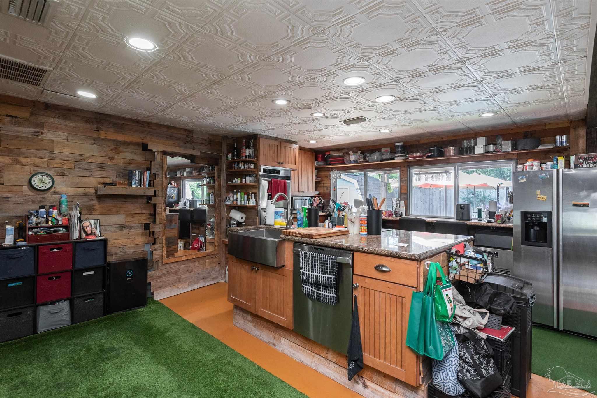 2322 Silversides Loop Pensacola, FL 32526 - Photo 5 of 29 a kitchen with lots of counter top space and cabinets
