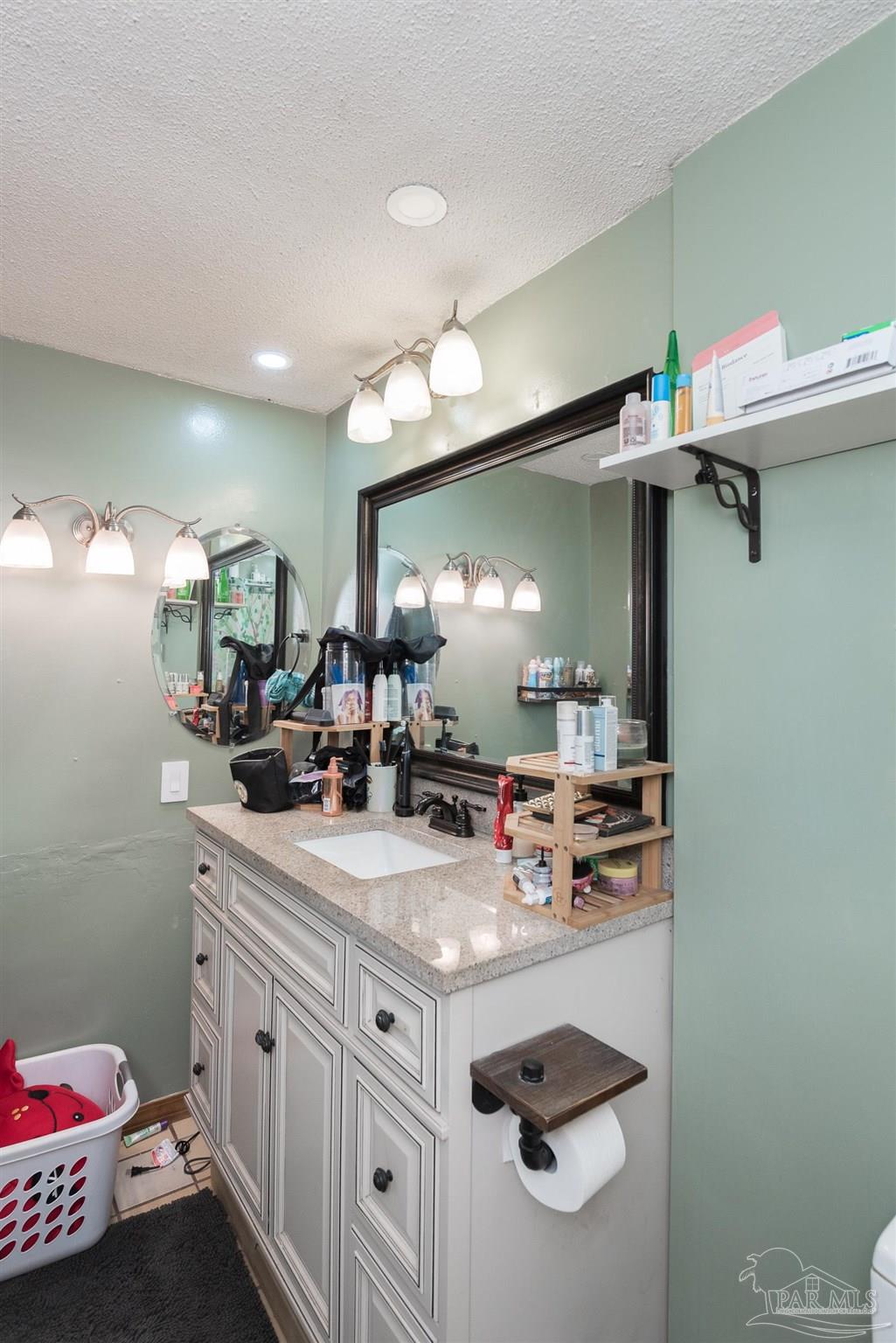 2322 Silversides Loop Pensacola, FL 32526 - Photo 10 of 29 a kitchen with sink and cabinets