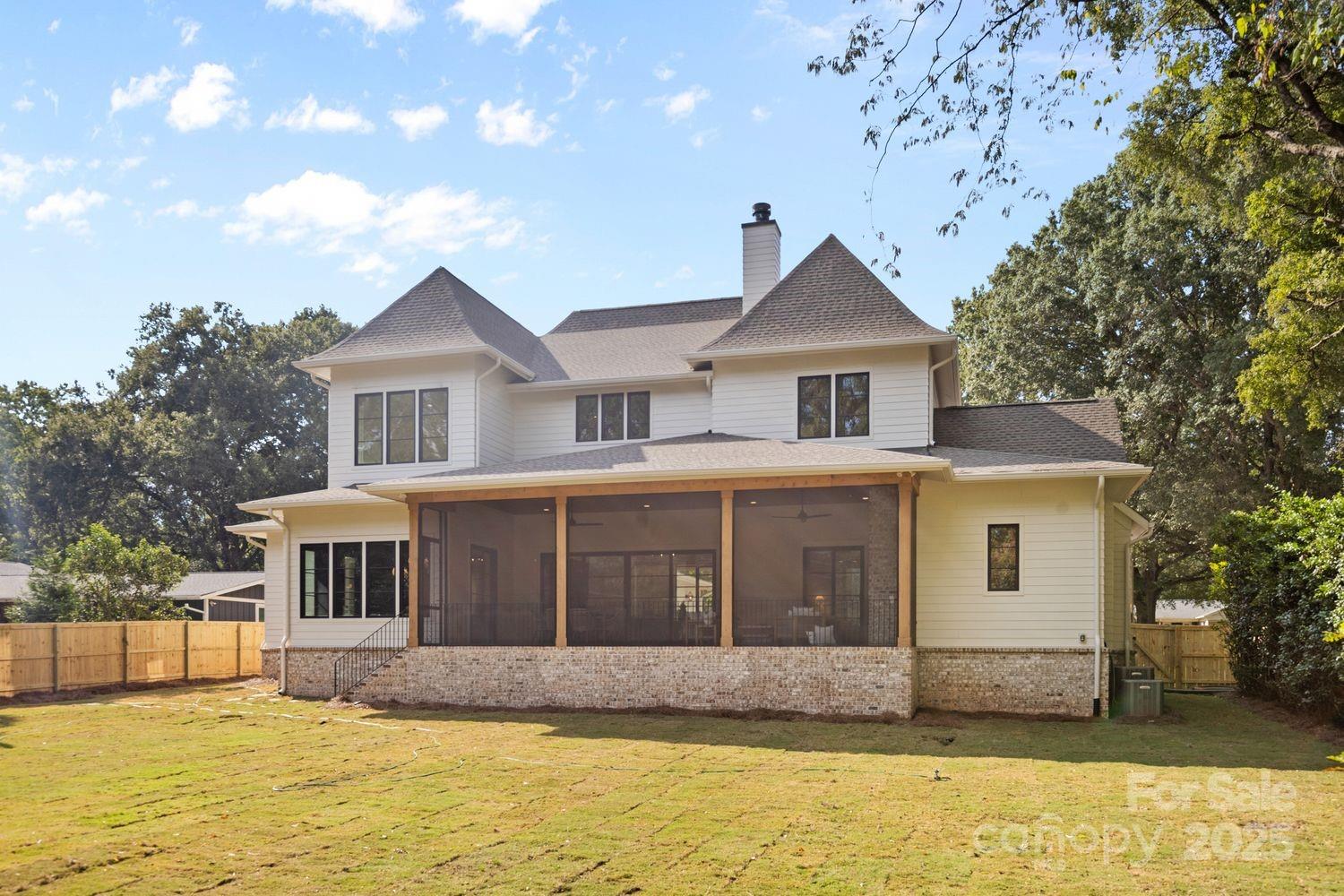 919 Lansdowne Road Charlotte, NC 28270 - Photo 2 of 3 a front view of a house with a yard