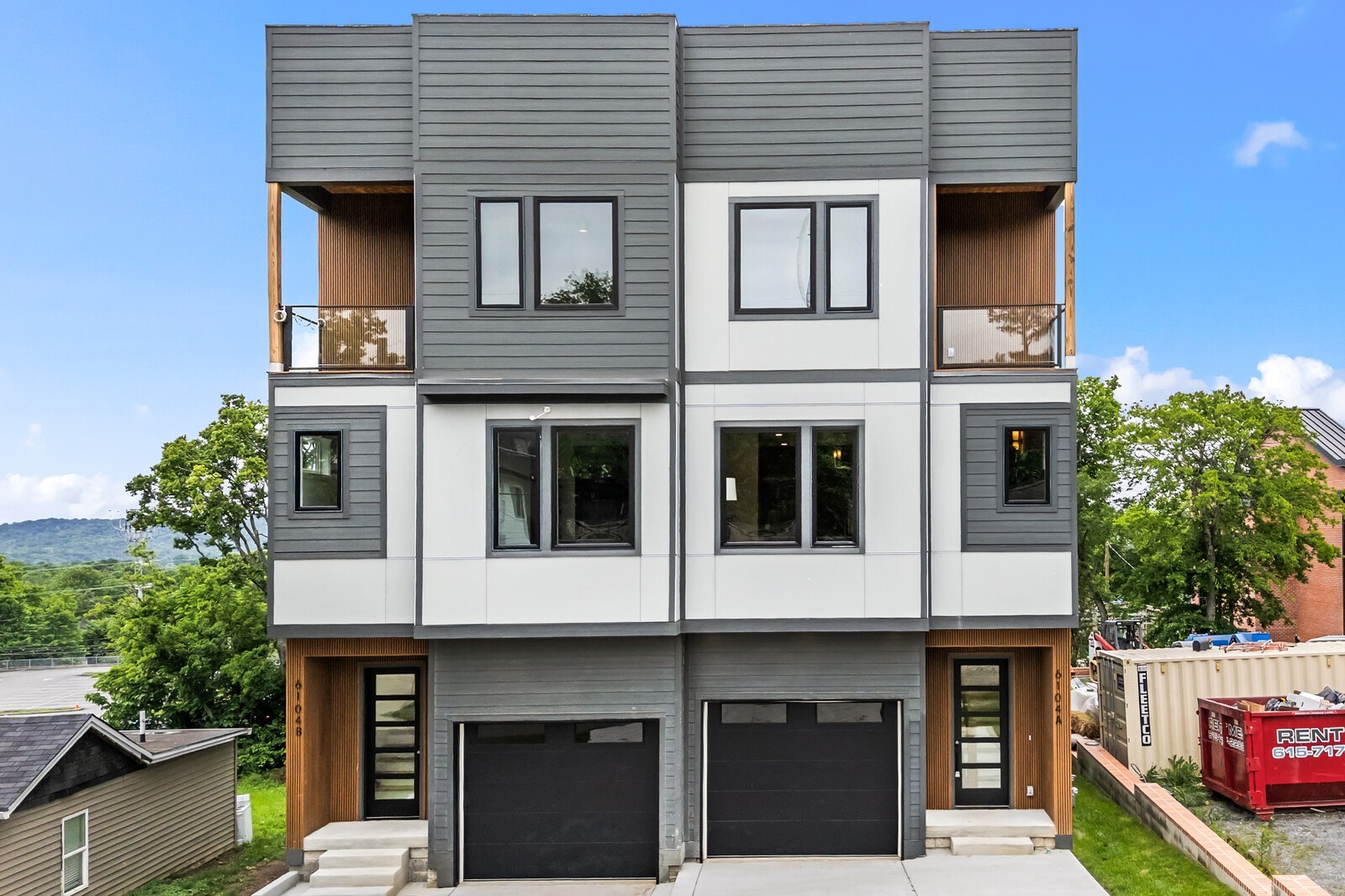 a view of building with a window and a tree