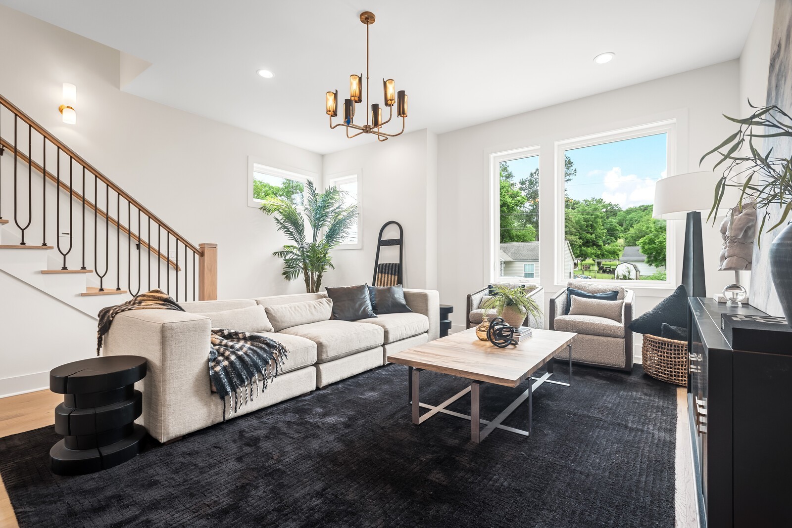6104 Cowden Avenue, Unit A Nashville, TN 37209 - Photo 11 of 40 a living room with furniture chandelier and a fireplace