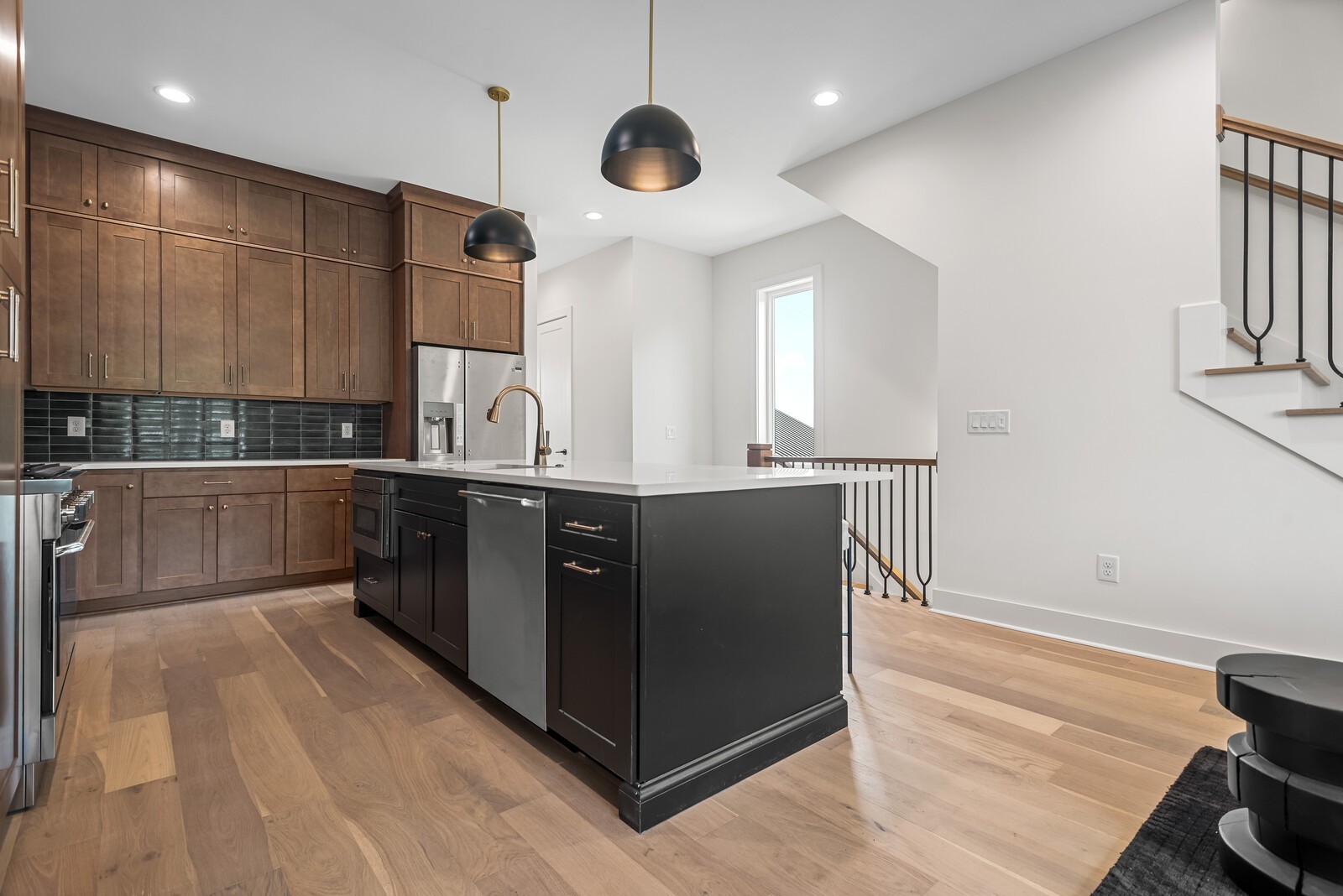 6104 Cowden Avenue, Unit A Nashville, TN 37209 - Photo 13 of 40 a kitchen with stainless steel appliances granite countertop a sink a stove and a refrigerator
