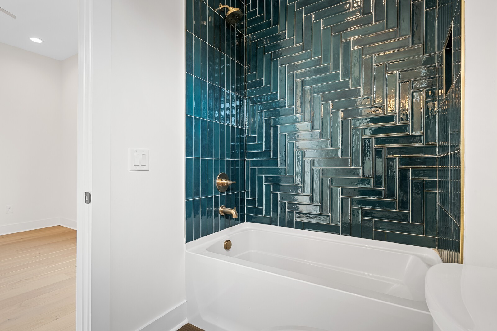 6104 Cowden Avenue, Unit A Nashville, TN 37209 - Photo 19 of 40 a bathroom with a bathtub and a shower