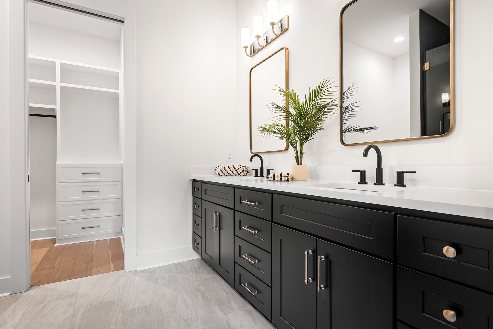 6104 Cowden Avenue, Unit A Nashville, TN 37209 - Photo 25 of 40 a bathroom with a double vanity sink and a mirror