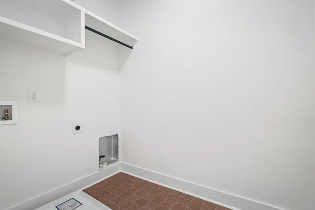 a view of small space with racks on the wall