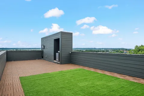 a view of a terrace with a lake view