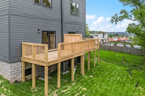 a view of a chairs and table in the patio