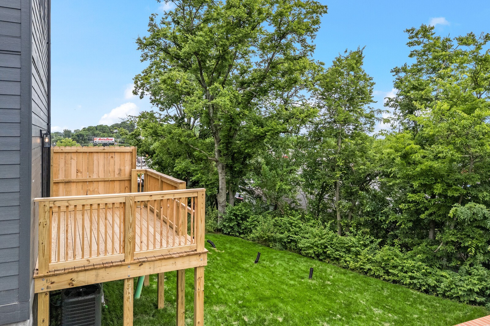 6104 Cowden Avenue, Unit A Nashville, TN 37209 - Photo 39 of 40 a view of a backyard with wooden fence and plants