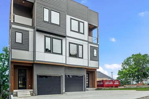 a front view of a multi story residential apartment building