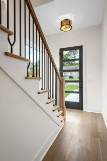 a view of entryway with wooden floor