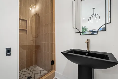 a bathroom with a sink and a mirror