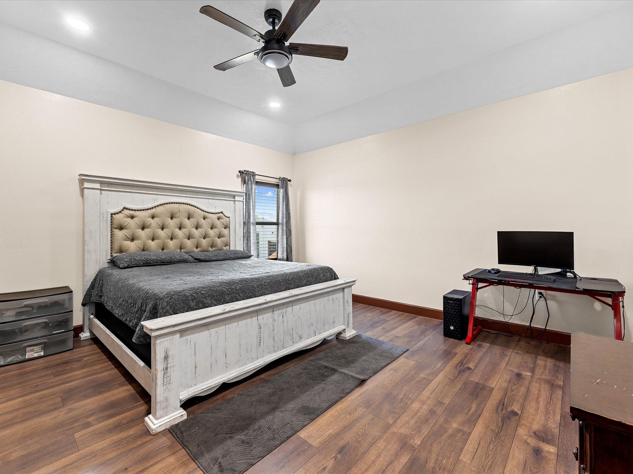 886 Zilss Road La Grange, TX 78945 - Photo 30 of 50 a bedroom with a bed and a desk