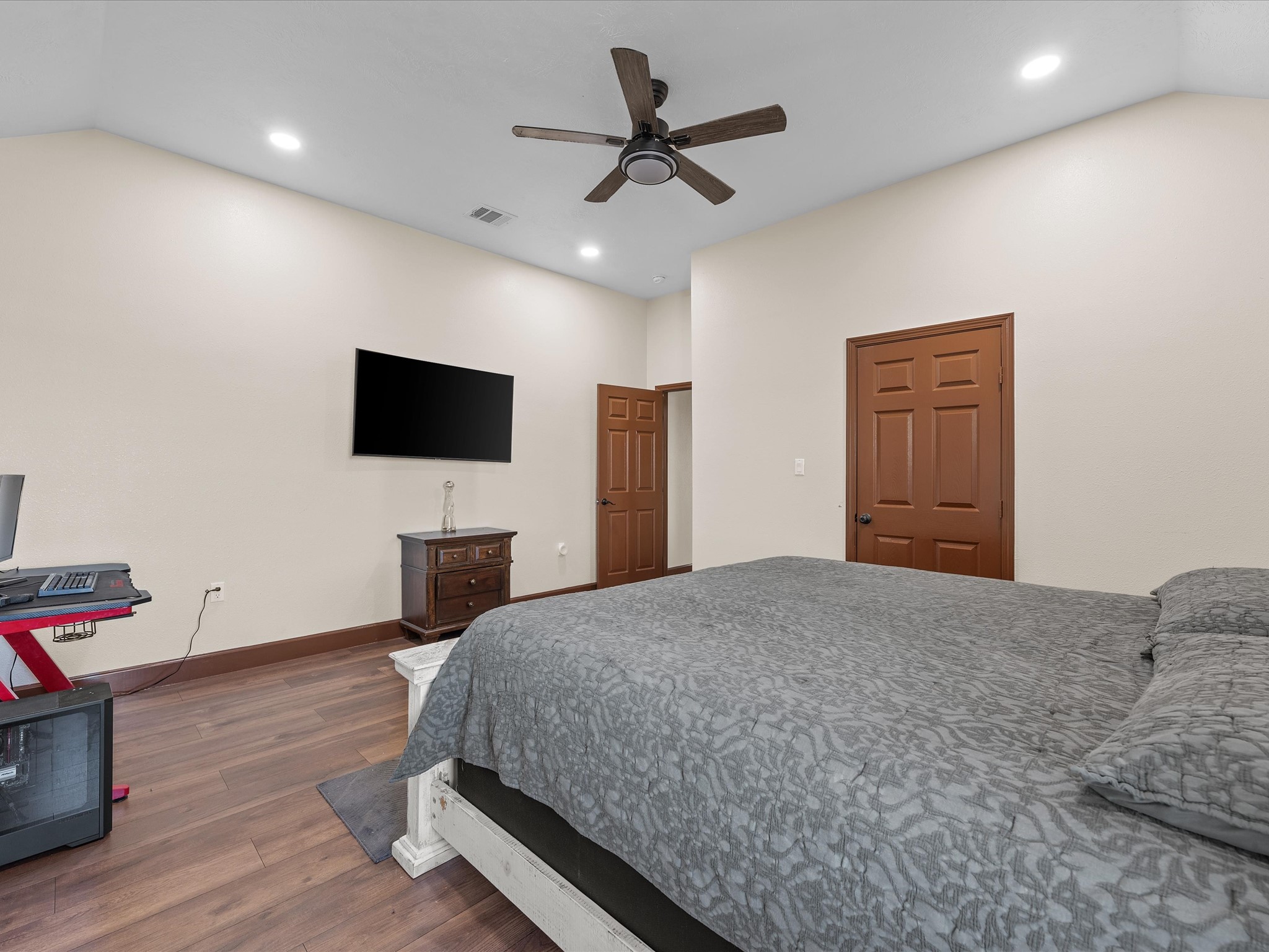 886 Zilss Road La Grange, TX 78945 - Photo 31 of 50 a bedroom with a bed and a flat screen tv