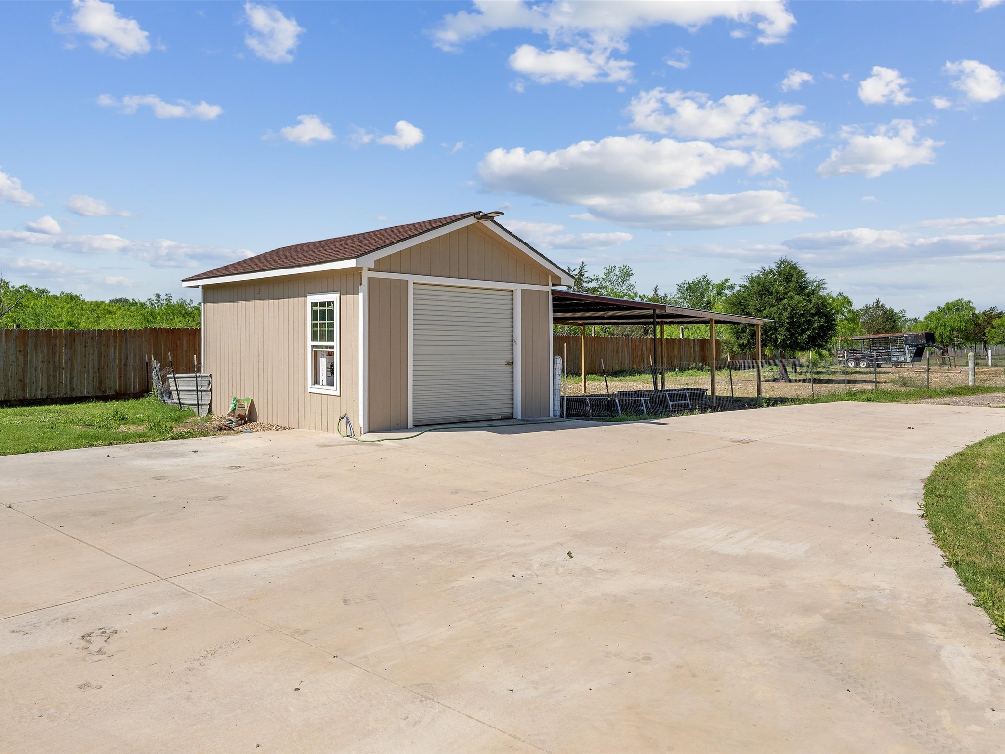 886 Zilss Road La Grange, TX 78945 - Photo 40 of 50 a view of a house with a yard