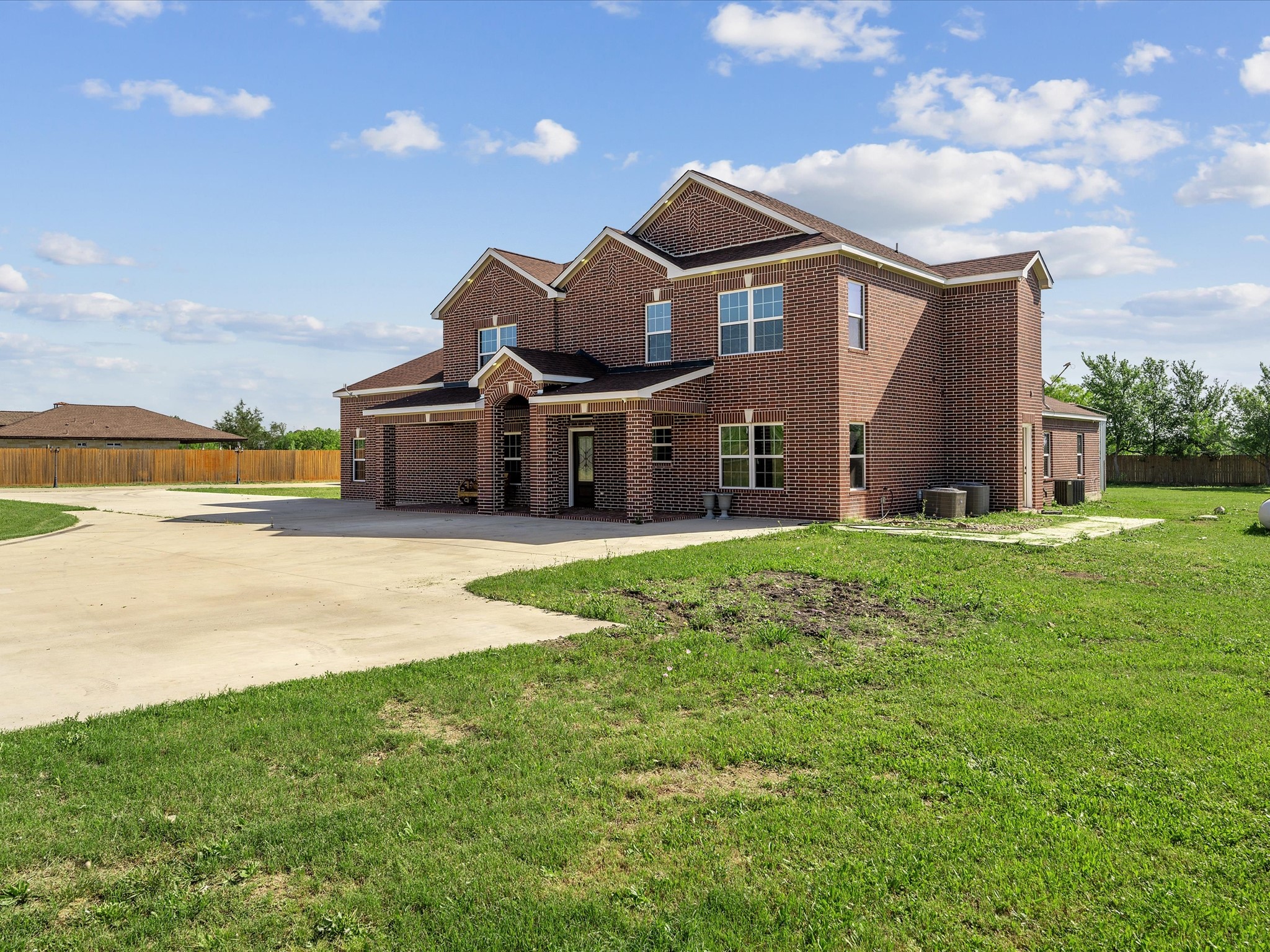 886 Zilss Road La Grange, TX 78945 - Photo 4 of 50 a front view of a house with garden