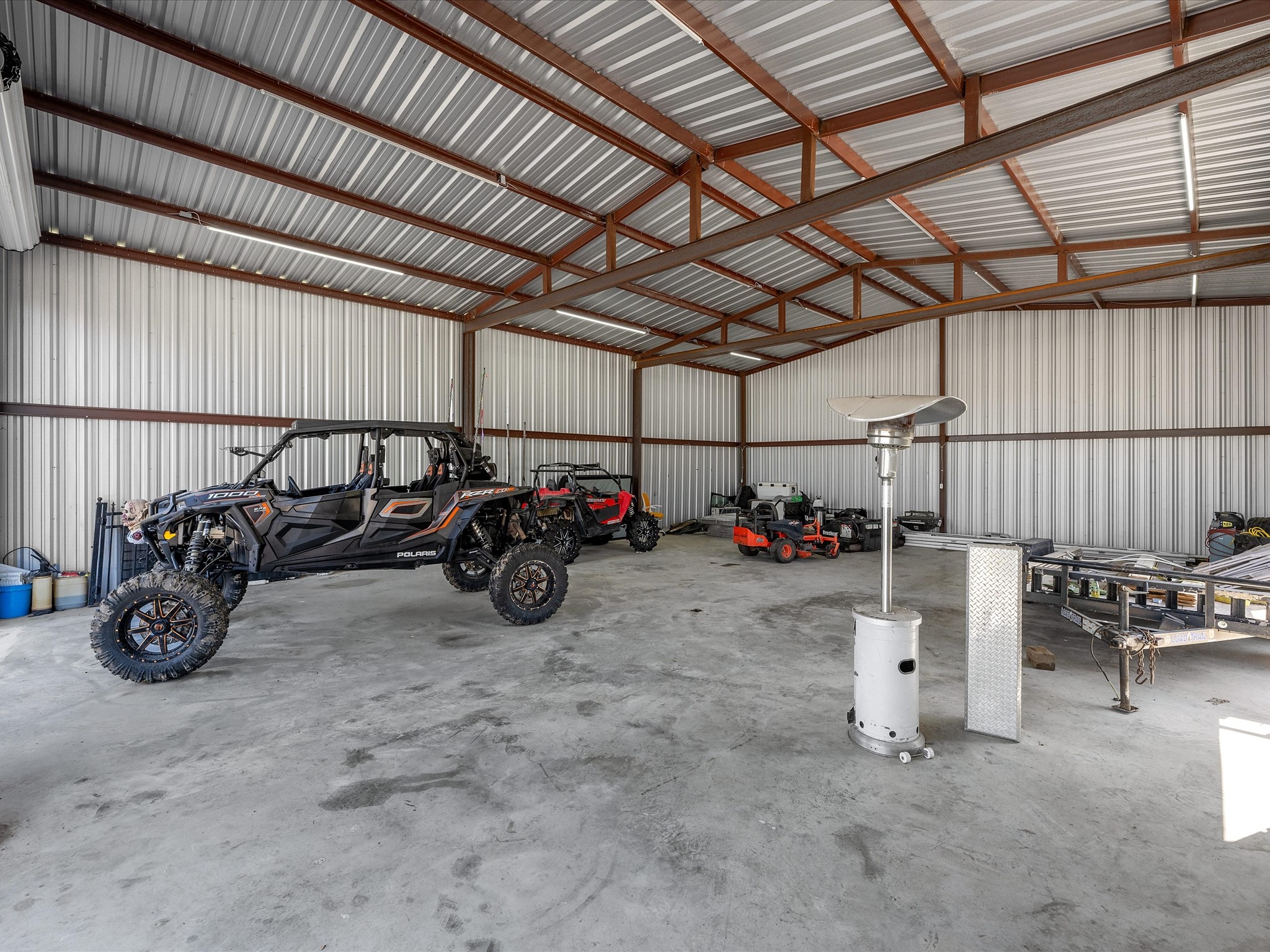 886 Zilss Road La Grange, TX 78945 - Photo 43 of 50 a view of a garage with rack and bicycle