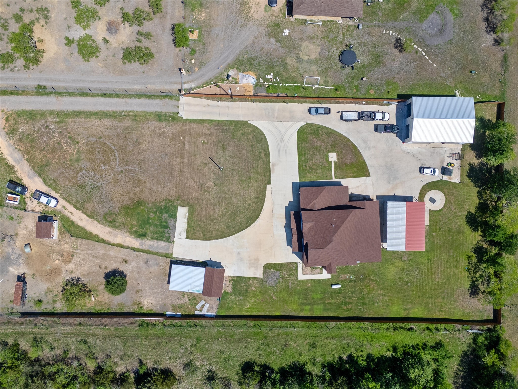 886 Zilss Road La Grange, TX 78945 - Photo 46 of 50 an aerial view of a house with a swimming pool