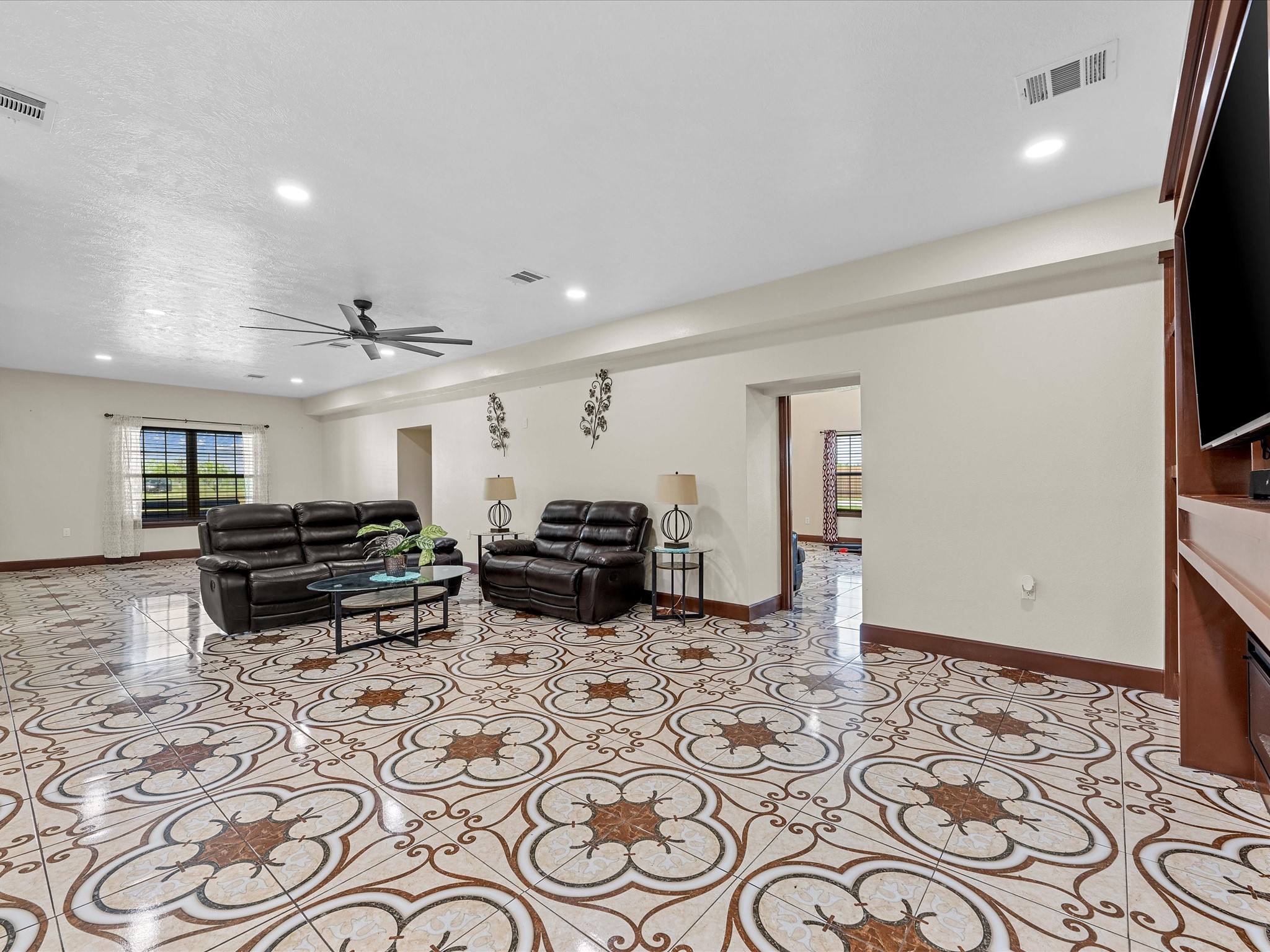 886 Zilss Road La Grange, TX 78945 - Photo 10 of 50 a large room with lots of chairs and wooden floor