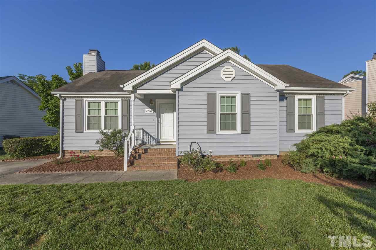 2300 Carthage Circle Raleigh, NC 27604 - Photo 1 of 18 a front view of a house with a yard