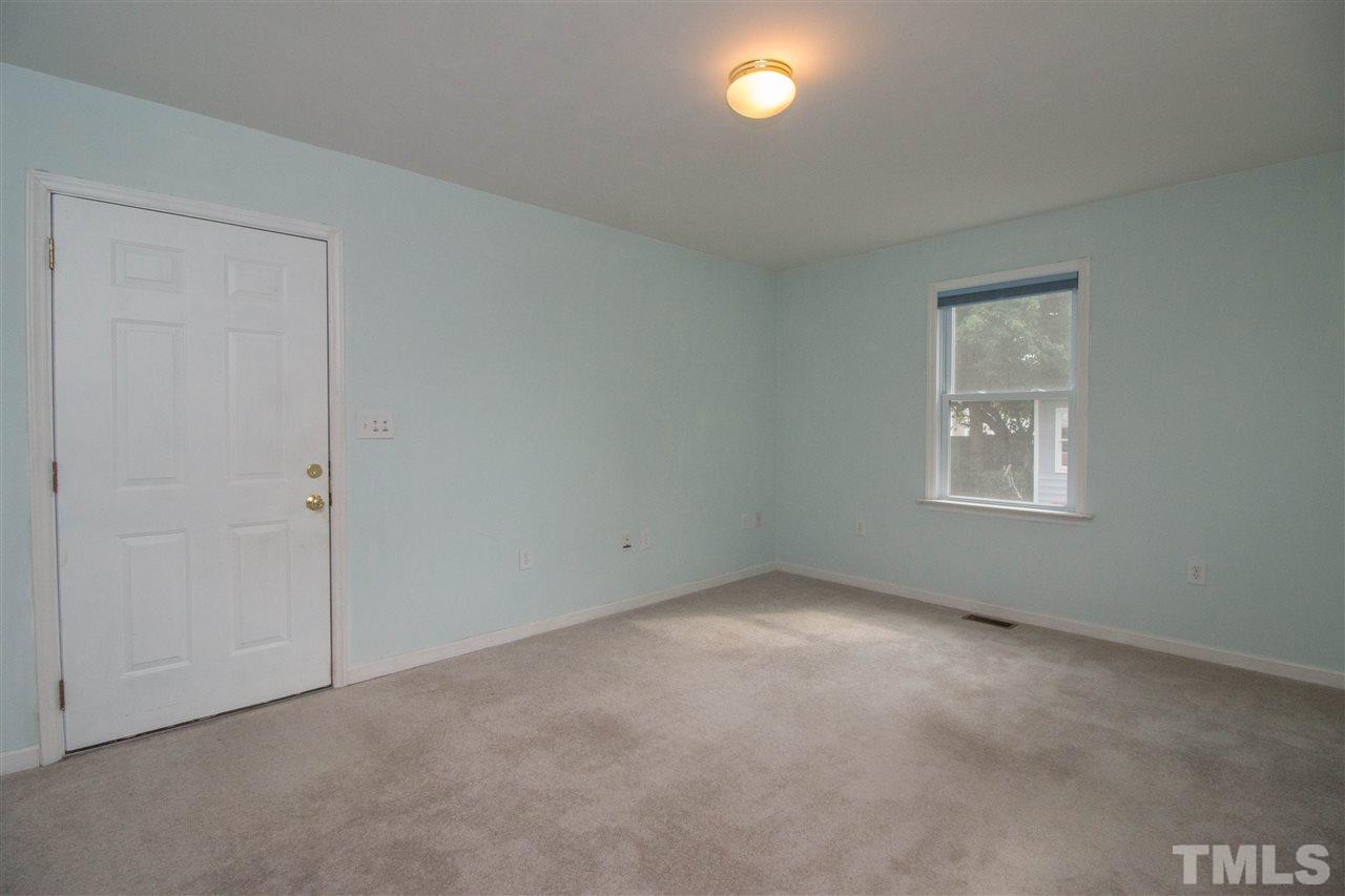 2300 Carthage Circle Raleigh, NC 27604 - Photo 7 of 18 an empty room with a window