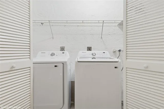 a utility room with dryer and washer