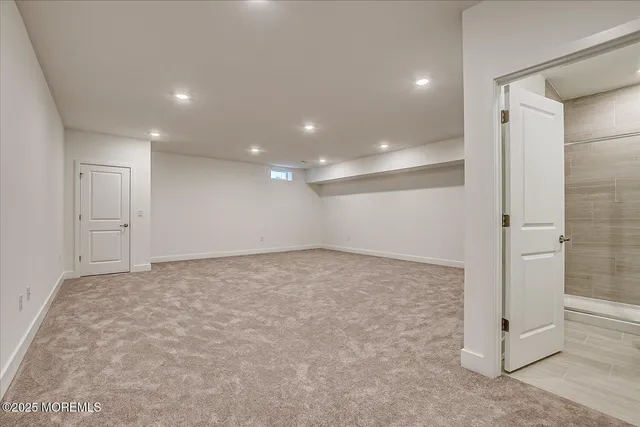 an empty room with a ceiling fan