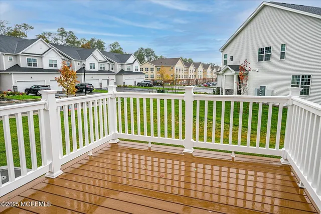 a view of house with a yard