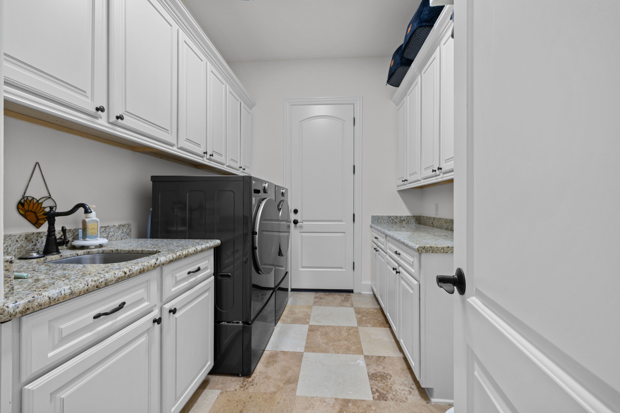 58 Shadow Creek Ridge Drive Spring, TX 77389 - Photo 23 of 49 Laundry room with room for 2nd fridge and access to the separate 3rd car garage w/ac