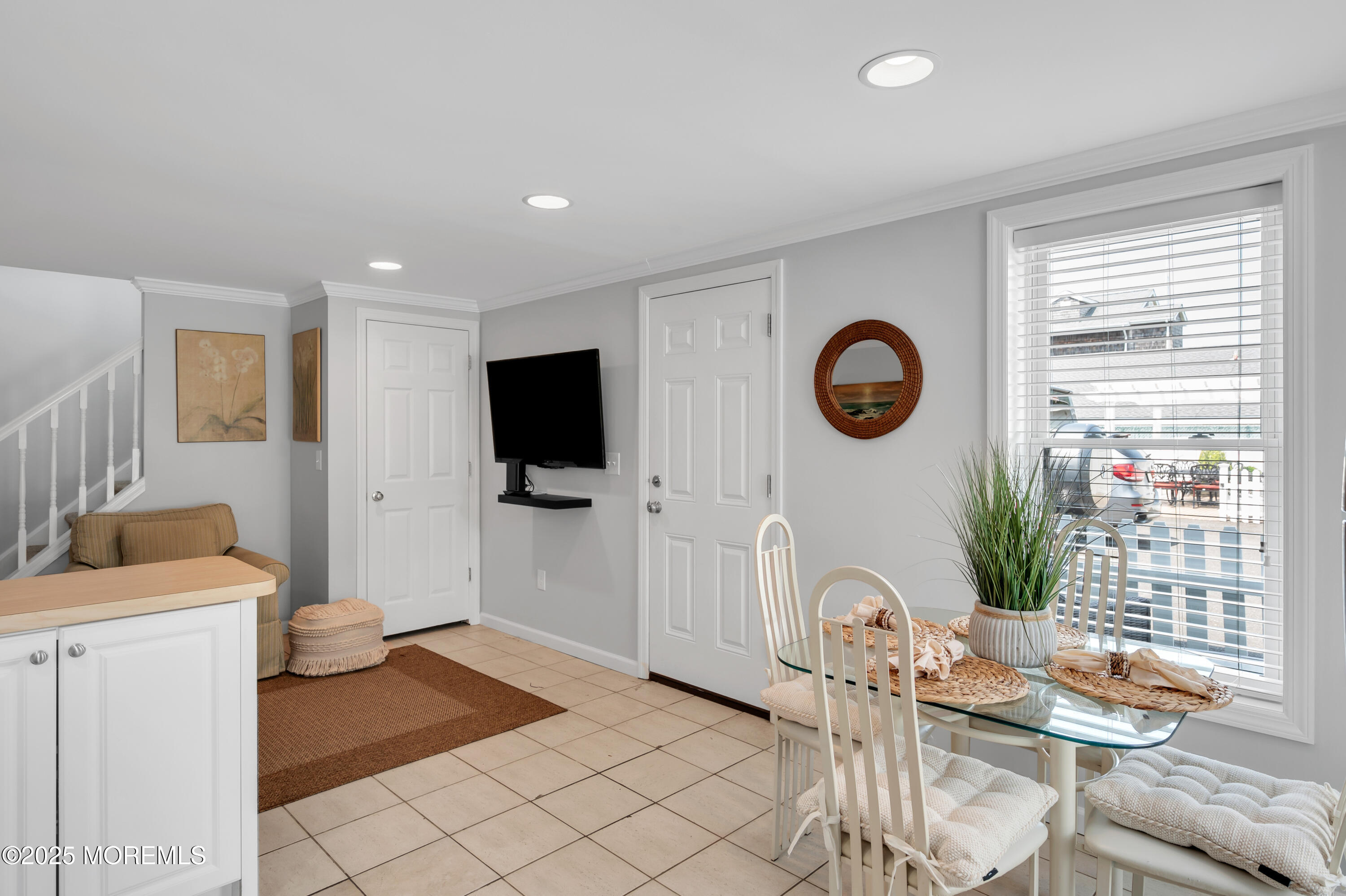 512 Main Avenue, Unit 5 Bay Head, NJ 08742 - Photo 13 of 35 a living room with furniture and a flat screen tv