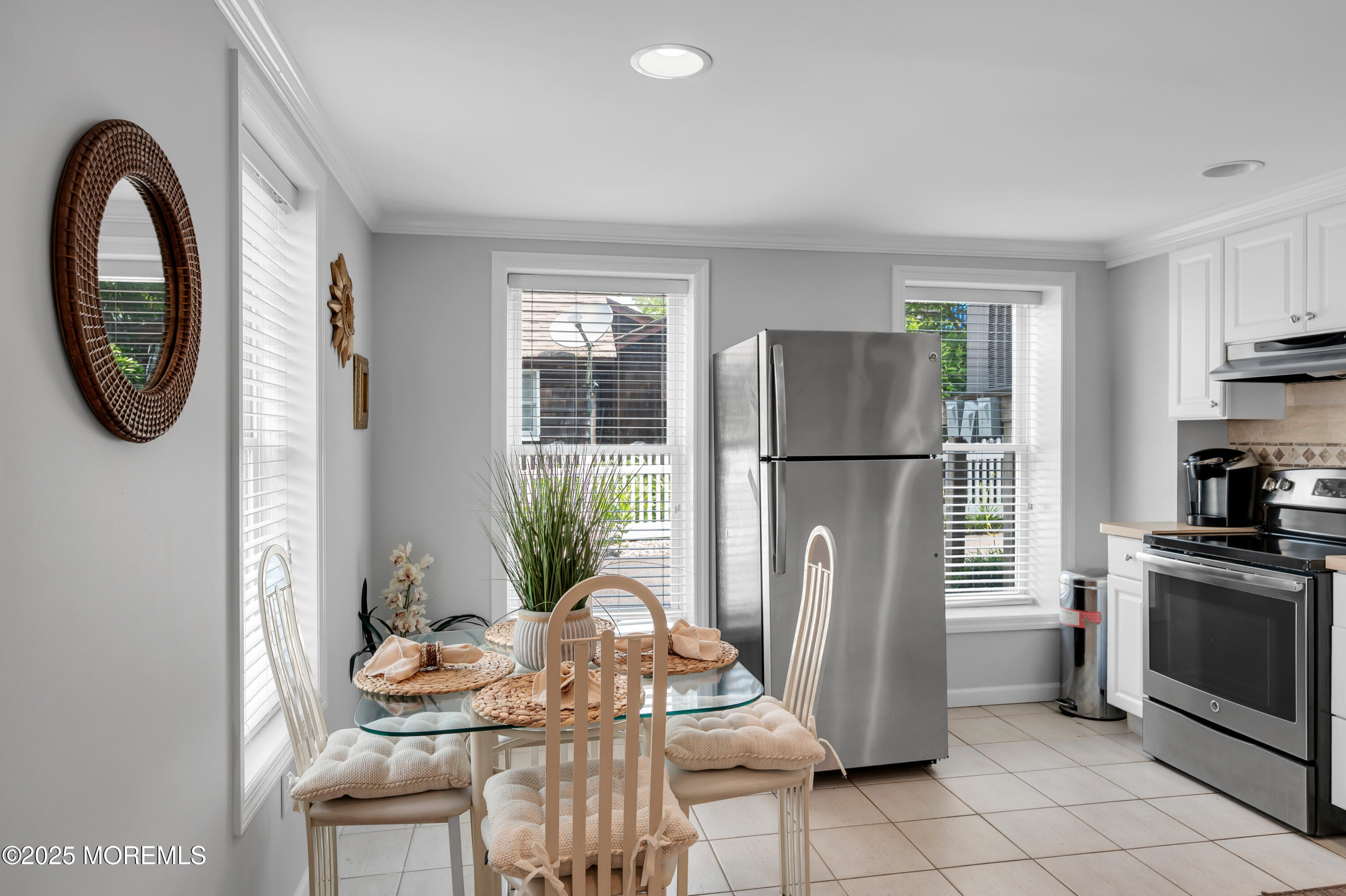 512 Main Avenue, Unit 5 Bay Head, NJ 08742 - Photo 14 of 35 a view of a kitchen with fridge and wooden floor