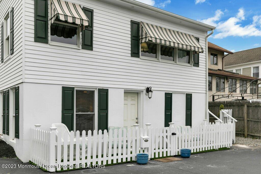 512 Main Avenue, Unit 5 Bay Head, NJ 08742 - Photo 23 of 35 a view of a house with wooden fence