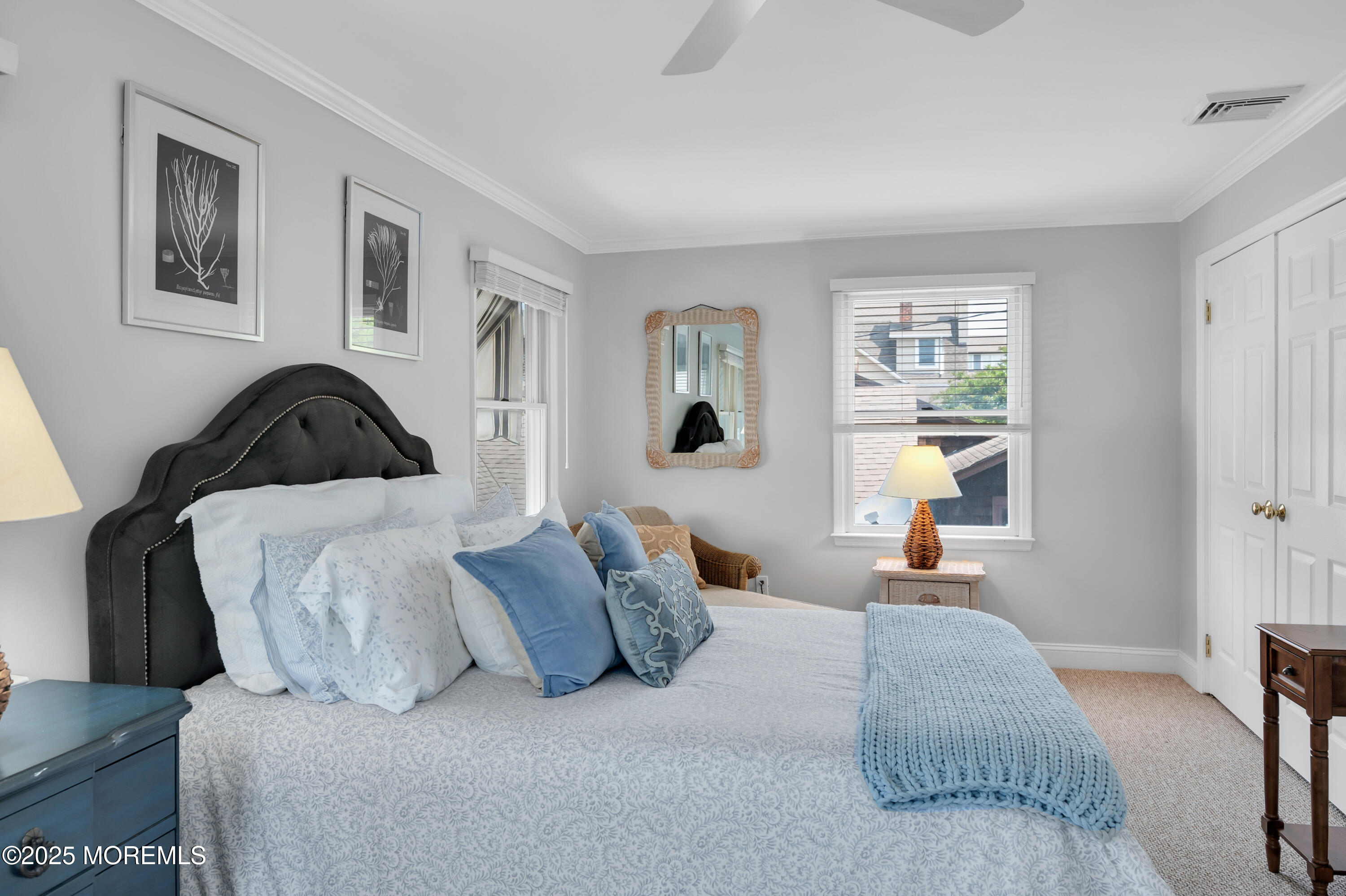 512 Main Avenue, Unit 5 Bay Head, NJ 08742 - Photo 5 of 35 a bedroom with a bed and wooden floor