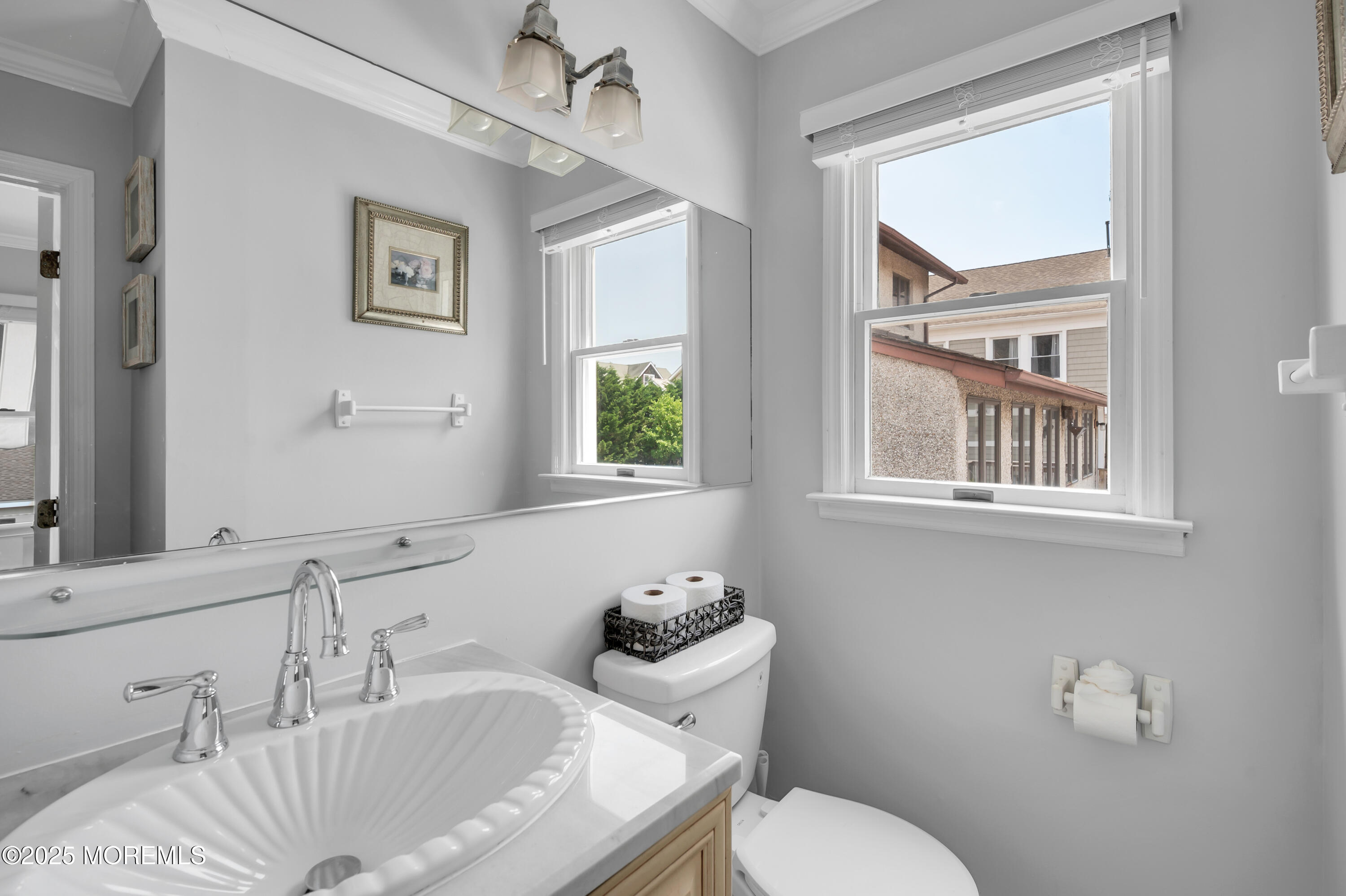 512 Main Avenue, Unit 5 Bay Head, NJ 08742 - Photo 7 of 35 a bathroom with a sink and a toilet