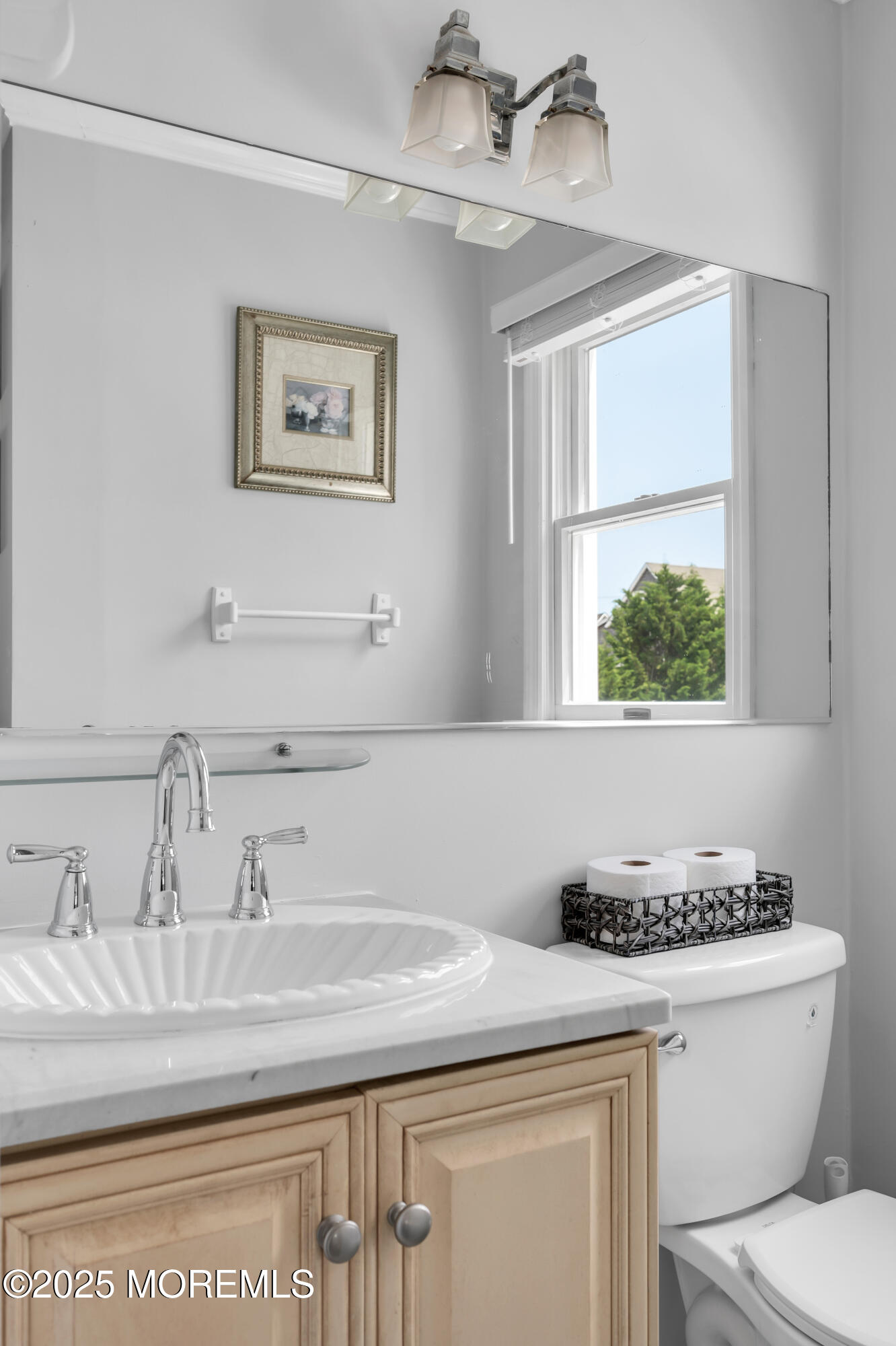 512 Main Avenue, Unit 5 Bay Head, NJ 08742 - Photo 8 of 35 a bathroom with a granite countertop sink a toilet and a mirror