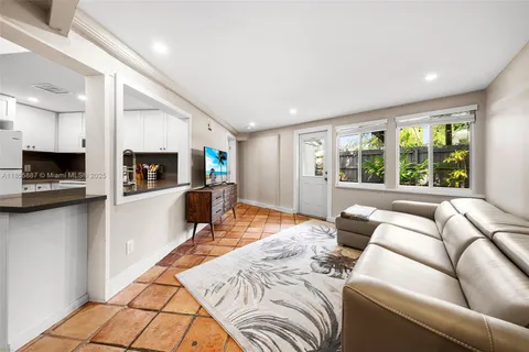 a bathroom with a toilet a sink and shower
