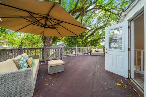 a view of a swimming pool with a lounge chair