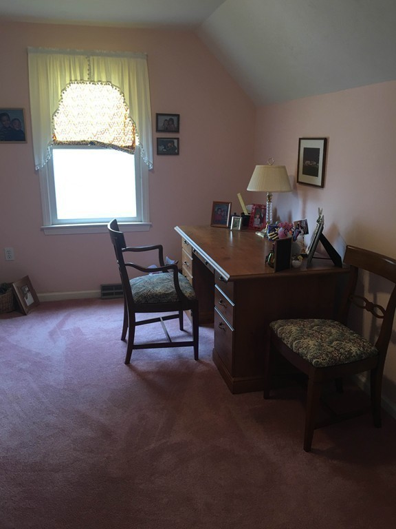 31 Country Side Road, Unit 31 Bellingham, MA 02019 - Photo 13 of 21 a living room with furniture and a window