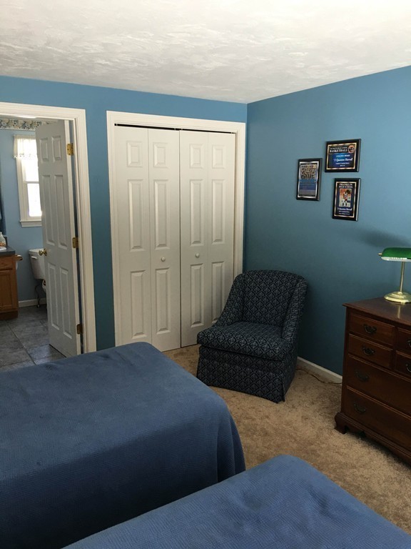 31 Country Side Road, Unit 31 Bellingham, MA 02019 - Photo 18 of 21 a bedroom with a bed and a couch