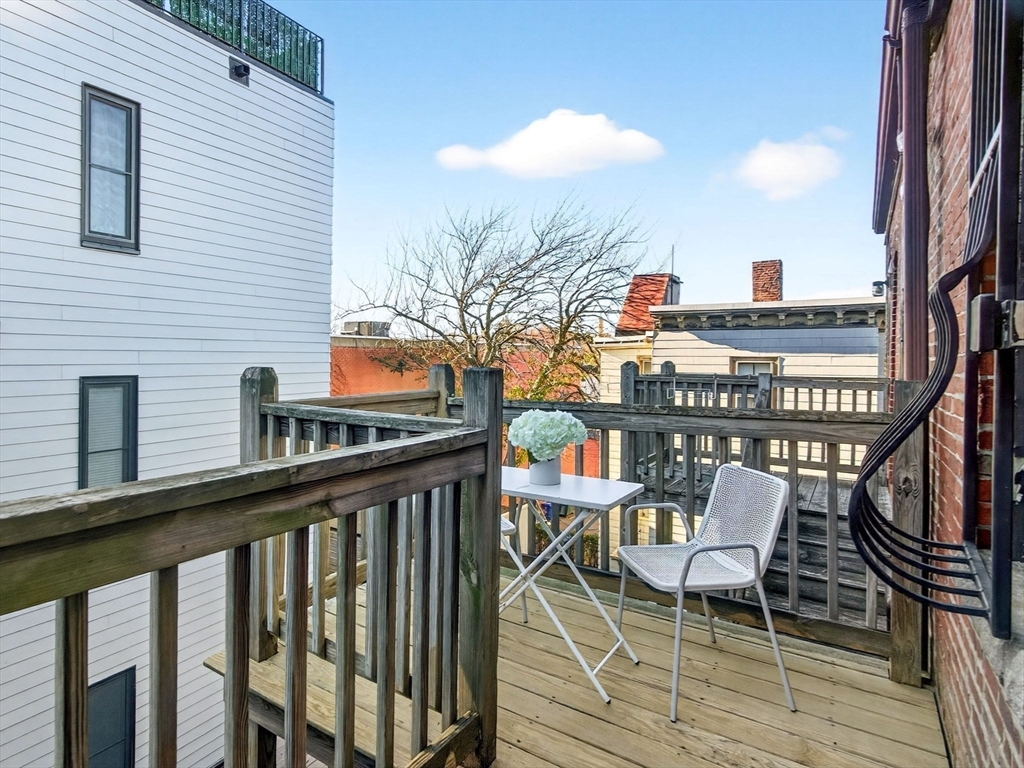 217 Boylston Street, Unit 3 Boston, MA 02130 - Photo 9 of 12 a view of a balcony chairs and outdoor seating