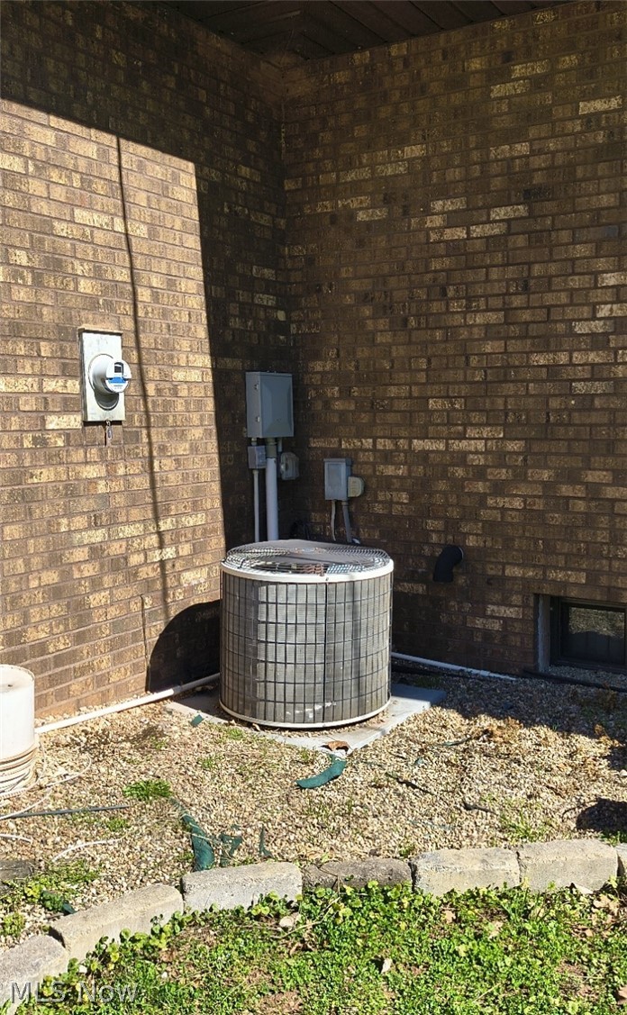10174 Veto Road Belpre, OH 45714 - Photo 9 of 45 view of central air, electrical and plug for generator hook up.