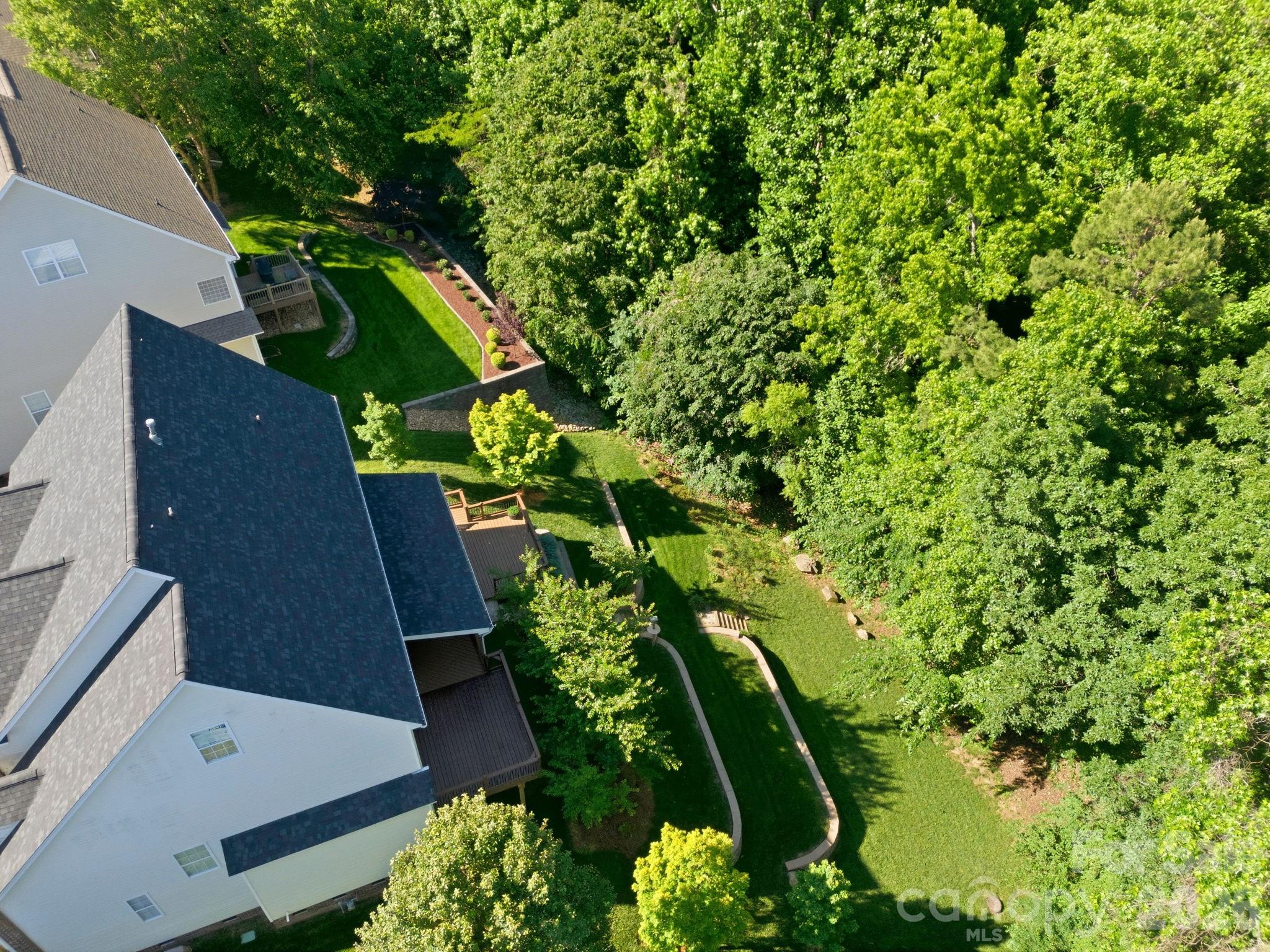 3308 Grandeur Road Charlotte, NC 28269 - Photo 43 of 45 an aerial view of a house with a yard