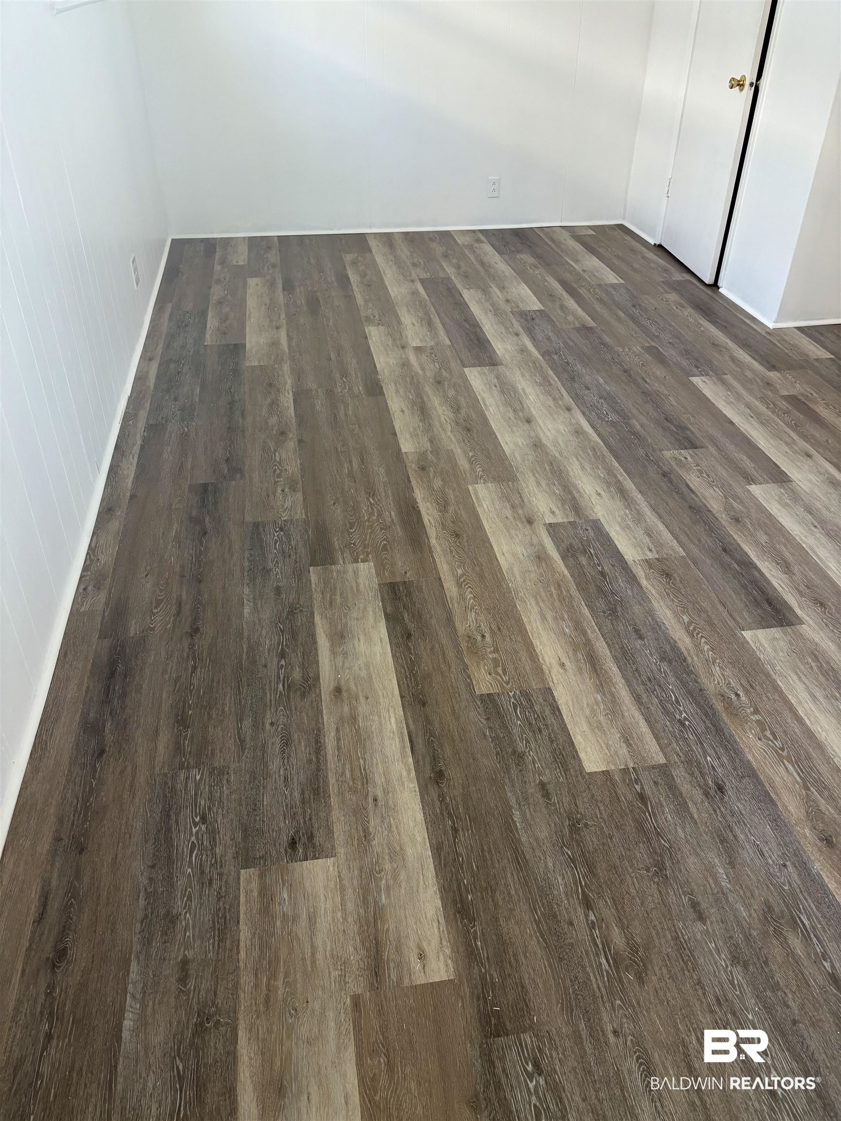 8959 Shore Drive Foley, AL 36535 - Photo 20 of 53 New flooring in living spaces