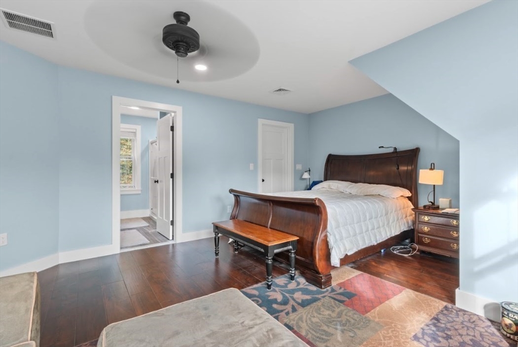 90 Walnut Road North Attleboro, MA 02760 - Photo 19 of 38 a bedroom with a bed and wooden floor
