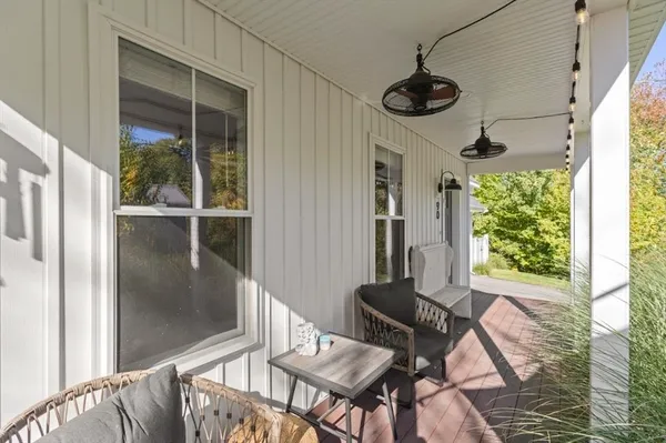 a view of a dining room with furniture window and outside view